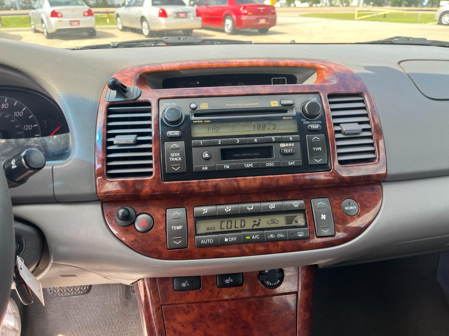 2006 red /TAN Toyota Camry LE V6 (4T1BF30KX6U) with an 3.0L V6 DOHC 24V engine, 5-Speed Automatic Overdrive transmission, located at 14700 Tomball Parkway 249, Houston, TX, 77086, (281) 444-2200, 29.928619, -95.504074 - Photo#13